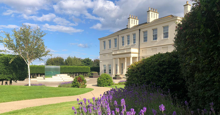 view of front of Seaham Hall Hotel on a bright sunny day